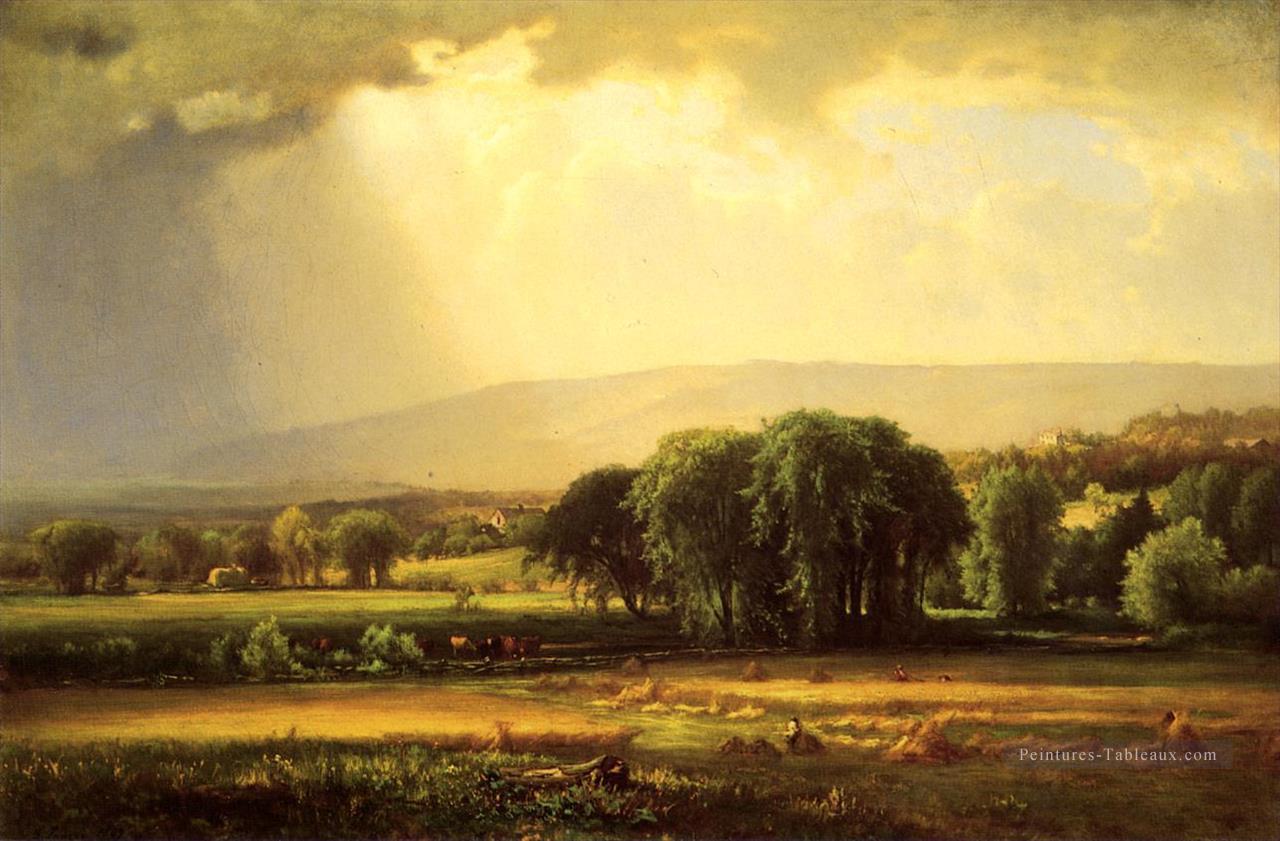 Scène de récolte dans le paysage de la vallée du Delaware Tonalist George Inness Peintures à l'huile